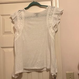 White ruffle blouse